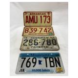 Four License Plates: Arkansas, Massachusetts, Kent