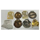 Eight Metal Belt Buckles Featuring Various Designs