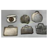 Six Metal Advertising Pocket Change Holders in Var