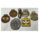 Seven Vintage Brass and Metal Watch Fobs and Adver