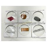 Six Tobacco Tags Featuring Various Brands and Loca