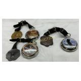 Three Pocket Watches with Decorative Fobs
