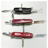Three Multi-Tool Pocket Knives Featuring Swiss Arm