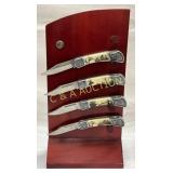 Four Folding Knives with Decorative Metalwork and