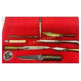 Display Case with 9 Knives and Accessories