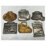 Six Early Metal Watch Fobs Featuring Construction