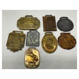 Eight Vintage Brass and Metal Fobs with Various De