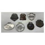 Seven Vintage Transportation-Themed Medallions