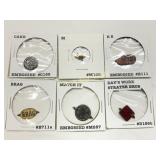 Six Embossed Tobacco Tags in Individual Holders