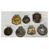 Seven Metal Souvenir Watch Fobs Featuring Various