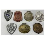 Seven Vintage Metal Medals with Diverse Designs an