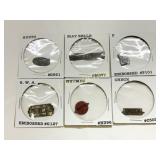 Six Embossed Tobacco Tags with Branded Designs