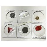 Six Tobacco Tags Featuring Various Designs and Emb