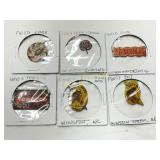 Six Tobacco Tags Featuring Various Brands and Desi