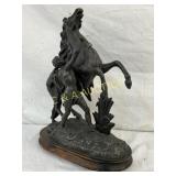Metal Sculpture Depicting a Rearing Horse and Hand