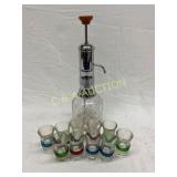 Glass Decanter with Chrome Pump Top and Eight Matc