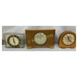 Three Mid-20th Century Table Clocks with Wood and