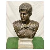 Bronze Bust Depicting a Roman Figure on White Marb