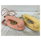 Two Rotary Dial Telephones in Pink and Yellow Plas