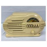 Cream-Colored Plastic Radio Cabinet with Built-In