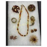 Amber-Colored Costume Jewelry, Including Brooches,