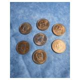 SEVEN UNITED STATES DOLLAR COINS