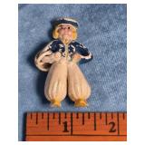 VINTAGE CELLULOID DUTCH BOY BROOCH