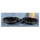2 VTG. LAS VEGAS HILTON BLACK GLASS ASHTRAYS
