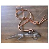 ANTIQUE CAST IRON TOOL CORN SHOCK TIE