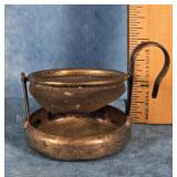 MID-20th CENTURY TILTING TEA STRAINER