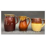 (3) Stoneware Pitchers, Hull, Roseville, and Other, 5"-7"h