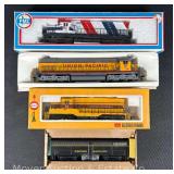 (4) HO Scale Locomotives, with Boxes