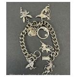 Charm Bracelet with (6)Sterling Silver Charms, Bracelet Not Silver