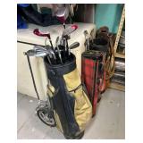 Group of Golf Clubs with Caddy Bags