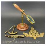 Magnifying Glass on Wood Stand, Inclinometer, Small Brass Anchor, Etc.