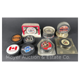 (9) Asst. Hockey Pucks