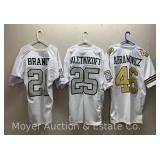 (3) Asst. Raiders and Saints Jerseys