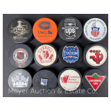 (12) Asst. Hockey Pucks