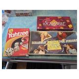 Games Yahtzee, Scabble, Scrabble Jr.