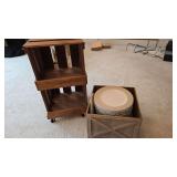 Crate of plastic charger plates and rolling crate stand.