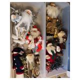 2 totes of Santa Claus figures