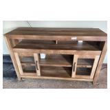 Stereo cabinet with 2 matching end tables. No contents are included