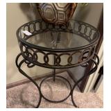 Metal stand with glass top with floral decor
