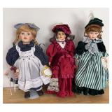 3 porcelain dolls