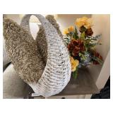 Basket with pillows. Floral arrangement. Lamp not included