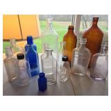 Flat of antique apothecary bottles