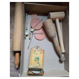 Vintage kitchen rolling pin and leather tools