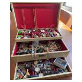 Box of costume jewelry.