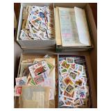Lot of mostly all cancelled postage stamps from around the world