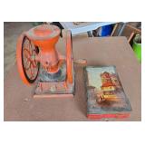 Antique coffee grinder and tin